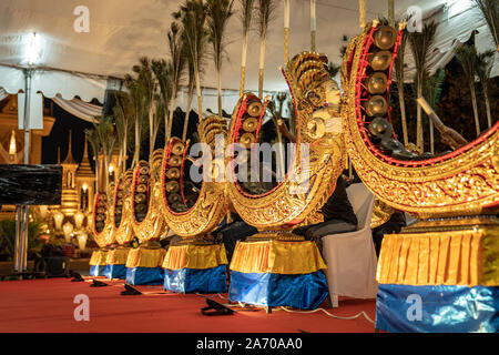 Ancient Thai music instrument and band are played by student in temple event at the night. Stock Photo