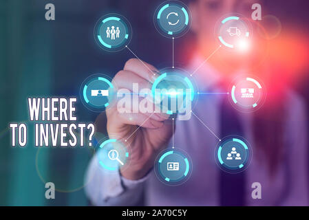 Conceptual hand writing showing Where To Invest Question. Concept meaning asking about where put money into financial schemes or shares Picture photo Stock Photo