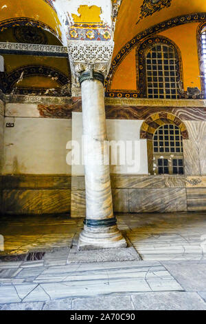 Inside famous Hagia Sophia Cathedral in Istanbul (Constantinople), Turkey. The inclined column is the result of an earlier earthquake. Stock Photo