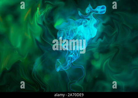 Blue diffusion of ink in liquid Stock Photo