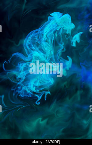 Artistic background with blue ink diffusion in liquid Stock Photo