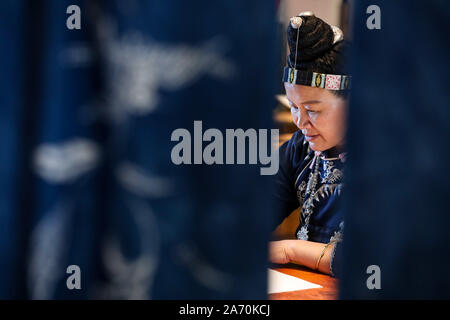 191029 Guizhou Oct 29 2019 Xinhua Yang Fang Draws Batik Patterns At Home In Danzhai County Southwest China S Guizhou Province Oct 28 2019 Batik A Craft Inherited Through Generations Among