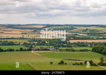 Far reaching views over the Hampshire countryside from South Downs Way near Beacon Hill National Nature Reserve east of Winchester, England. Stock Photo