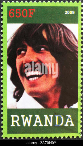 George Harrison on postage stamp of Rwanda Stock Photo