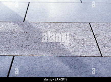 Architecture. Commercial building detail. Textured granite tiled floor. Stock Photo