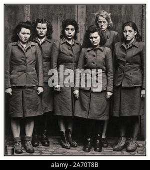 Vintage WW2 Belsen captured Nazi SS female camp guards group in Bergen-Belsen. Infamous brutal concentration camp, the scene of many indescribably cruel medical experiments and brutal violent crimes against humanity Belsen Germany 1945 Stock Photo