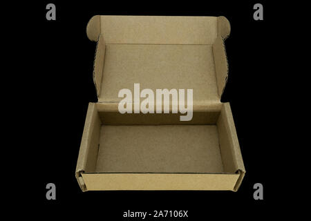 Top and perspective view of opened cardboard rectangle box isolated on black background Stock Photo