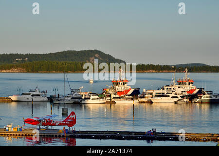 Float planes and boats moored at the docks in Nanaimo harbour on Vancouver Island British Columbia Canada. Stock Photo