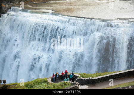 people standing overlooking Middle Falls at Letchworth State Park in upstate New York Stock Photo