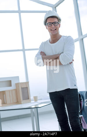 young dreaming architect through his office window Stock Photo