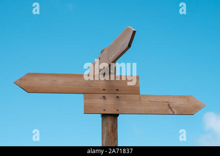 blank wooden direction signs mock-up - empty road sign isolated Stock Photo
