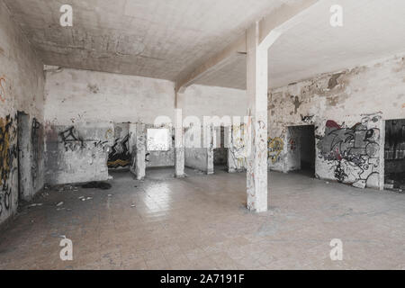 empty run down room inside abandoned building ruin Stock Photo