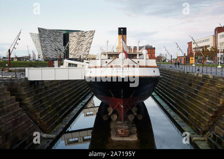 The SS Nomadic, the tender ship to the Titanic, at Hamilton Dock, The Titanic Centre, Belfast, Northern Ireland, UK Stock Photo
