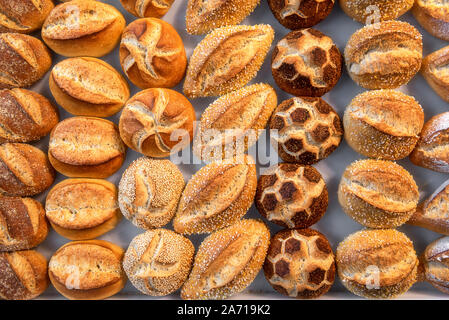 German bread rolls assortment. Diverse shapes of buns. Above view of many types of bread rolls. Buns in a variety of models. Traditional Bavarian buns Stock Photo