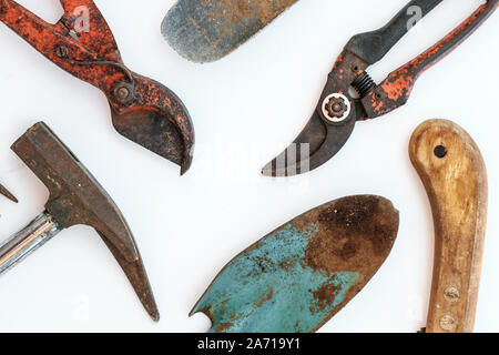 old tools, vintage garden tool set on white background