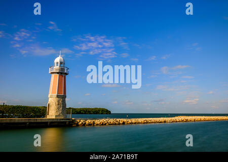 Grand Cayman, Cayman Islands, Jan 2019, David Alexander Anderson Memorial Lighthouse by the Caribbean Sea in the daytime Stock Photo