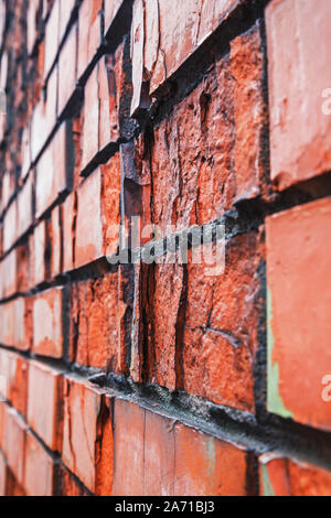Perspective view of old red destructed brick wall Stock Photo