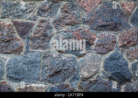 Granite stone wall texture with lots of details Stock Photo