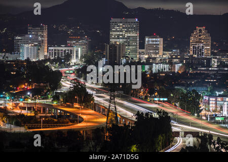 Night view of downtown Glendale office buildings and 134 freeway near Los Angeles in Southern California. Stock Photo