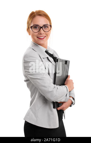 Portrait of a beautiful smiling young fashionable businesswoman holding a clipboard, isolated on white background. Stock Photo
