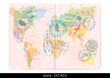 Stamp in passport for traveling an open passport. International travel document with visas, stamps, seals. Stock Photo