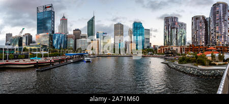 Panoramic view of Elizabeth Quay and Perth CBD from the Elizabeth Quay Bridge at sunset in Perth, WA, Australia on 22 October 2019