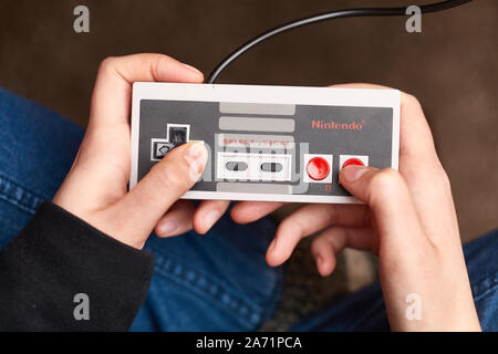 Nintengo NES,playing Super Mario 3 Stock Photo