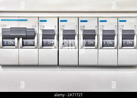 Automatic devices of protection against overloads in the power supply network. Circuit breakers or automatical fuses are the electrical protective dev Stock Photo