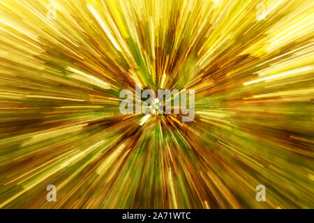 Motion blur with a zoomed lens while the shutter is pressed for a vivid background image. Stock Photo