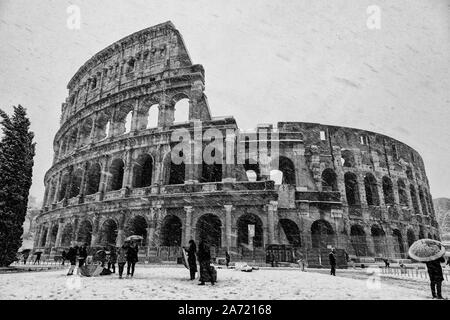 Colosseo under the snow. It snows in Rome just every ten years and maybe because of the global warming it will not happen again Stock Photo