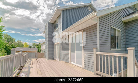 Panorama Modern two storey home with unfinished deck area Stock Photo