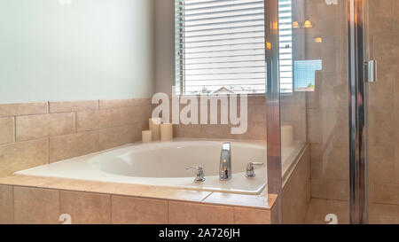 Modern bathroom with jacuzzi bath, copy space Stock Photo - Alamy