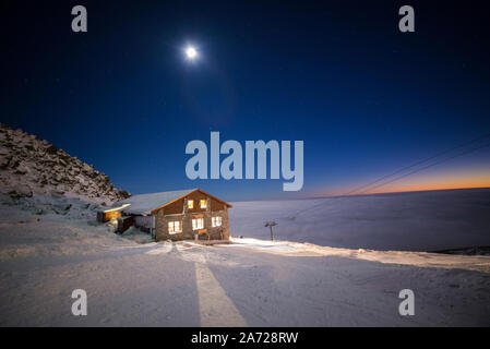 Kamenna Chata - Chopok, Nizke Tatry, Cottage on the top of a mountain, Above the clouds in winter Stock Photo