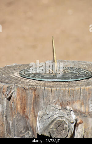 Sun Dial on a Stump Stock Photo