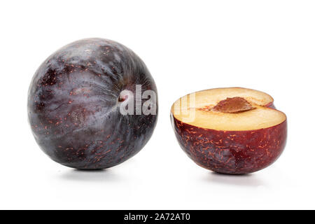 Group of one whole one half of fresh red plum isolated on white background Stock Photo