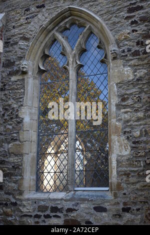 A stained glass window at St Michael's Church of the Open University. A Grade II* Listed Building on the campus at Walton Hall, Milton Keynes. Stock Photo