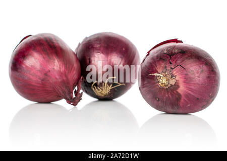 Group of three whole tasty onion red isolated on white background Stock Photo