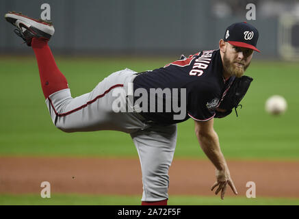 Houston, United States. 29th Oct, 2019. Washington Nationals Trea Turner  (7) ruled interfering with Houston Astros first baseman Yuli Gurriel  fielding of a throw in the seventh inning in Game 6 of