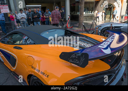 Los Angeles, California, USA. 29th Oct, 2019. McLaren had its road cars on display at the Hollywood F1 Festival. The iconic are of Hollywood Boulevard containing the Walk of Fame and The Chinese Theater was closed to allow Formula 1 to showcase classic and modern F1 cars and allow the Mercedes, Red Bull, and Renault cars to drive on the street. Team divers Valtteri Bottas (Mercedes), Max Verstappen (Red Bull), and Daniel Ricciardo (Renault) were present to meet F1 fans and pilot the cars. Credit: Stan Sholik/ZUMA Wire/Alamy Live News Stock Photo