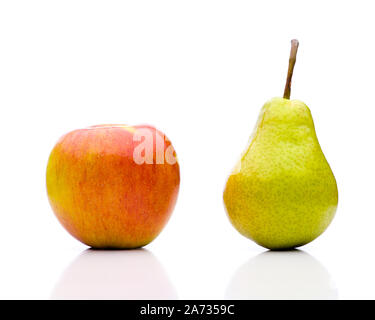 Comparing apples to oranges - the juxtaposition Stock Photo