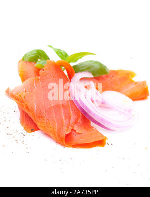 Salmon slices with onion isolated on white background Stock Photo