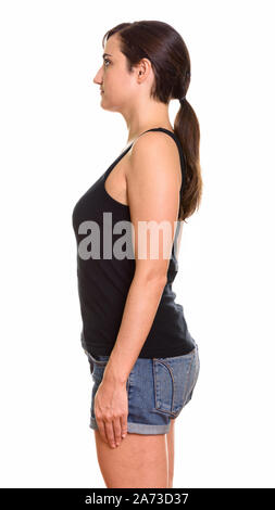 Profile view of young beautiful woman with hair tied Stock Photo