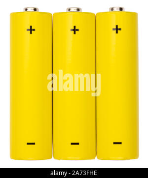 Top view of three yellow AA alkaline batteries (Mignons) or NiMH rechargeable cells isolated on white background Stock Photo