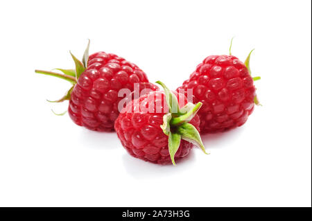 Ripe and juicy raspberries isolated on a white background in close-up Stock Photo