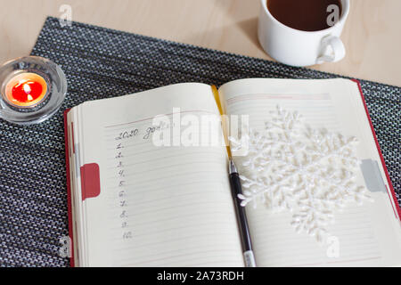 New Year's goals with colorful decorations. New Year's goals are resolutions or promises that people make for the New Year to make their upcoming year Stock Photo