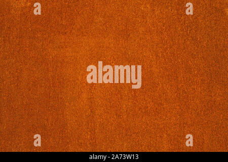 Rust and oxidized metal brown texture. Rusted orange grunge metal background. Old and dirty iron building wall Stock Photo