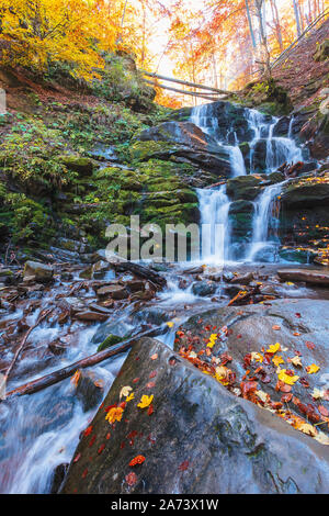 waterfall Shypot in gorgeous evening light. beautiful autumn scenery of Carpathian nature wonders Stock Photo