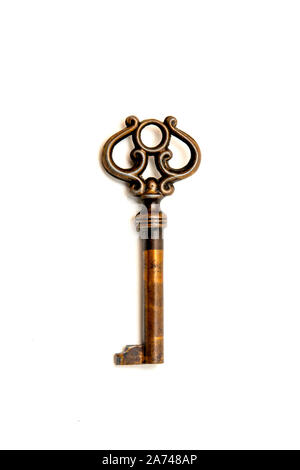 Ornate key on a white background Stock Photo