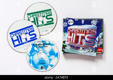 Christmas Hits CD showing booklet and 3 CDs isolated on white background - 60 festive favourites music Stock Photo