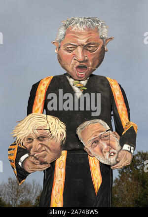 The repaired effigy of Speaker John Bercow, holding the heads of Prime Minister Boris Johnson and Labour party leader Jeremy Corbyn, by the Edenbridge Bonfire Society at Breezehurst Farm Industrial Park, which will be burned at an annual bonfire celebration in Edenbridge, Kent. Stock Photo